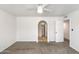 Bedroom with carpet, an arched hallway, and closet at 14626 N Fountain Hills Blvd, Fountain Hills, AZ 85268