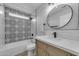 Updated bathroom with patterned tile and modern vanity at 10103 E Plata Ave, Mesa, AZ 85212