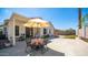 Relaxing backyard patio with table, chairs, and umbrella at 3408 W Sands Dr, Phoenix, AZ 85027