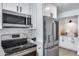 Modern kitchen with stainless steel appliances at 2616 S Extension Rd, Mesa, AZ 85210