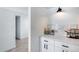 White kitchen pantry with quartz countertops at 2616 S Extension Rd, Mesa, AZ 85210