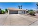 House with a two-car garage and desert landscaping at 2616 S Extension Rd, Mesa, AZ 85210