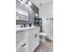 Modern bathroom with white vanity and gray walls at 2616 S Extension Rd, Mesa, AZ 85210