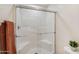 Clean shower with glass enclosure and built-in seat at 4631 E Alfalfa Dr, Gilbert, AZ 85298