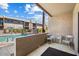 Private patio overlooking the community pool at 7436 E Chaparral Rd # B148, Scottsdale, AZ 85250