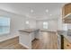 Modern kitchen with island and light wood cabinets at 1608 E Main St # 98, Mesa, AZ 85207