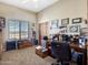 Home office with built-in desk and storage at 20102 W Camelback Rd, Litchfield Park, AZ 85340