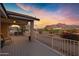 Spacious deck overlooking a scenic landscape with mountain views at 77 S Arroya Rd, Apache Junction, AZ 85119