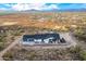 Aerial view of a house and surrounding desert landscape at 1829 W Cloud Rd, Phoenix, AZ 85086