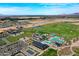 Aerial view of community amenities including pool, clubhouse, and golf course at 11268 N Williamsburg Ave, Surprise, AZ 85388