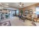 Open living room with views into kitchen and dining area at 20377 W Terrace Ln, Buckeye, AZ 85396