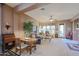 Spacious living room with comfortable seating and a view to the backyard at 20377 W Terrace Ln, Buckeye, AZ 85396
