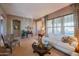 Spacious living room showcasing comfortable seating and a coffee table at 20377 W Terrace Ln, Buckeye, AZ 85396