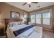 Main bedroom with a king-size bed and plenty of natural light at 20377 W Terrace Ln, Buckeye, AZ 85396
