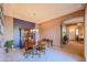 Formal dining room featuring a wooden table and china cabinet at 20377 W Terrace Ln, Buckeye, AZ 85396