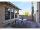 Inviting patio with a bistro table and chairs, perfect for outdoor dining at 20377 W Terrace Ln, Buckeye, AZ 85396