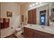 Bathroom with double vanity, toilet and shower at 20377 W Terrace Ln, Buckeye, AZ 85396