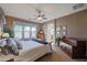 Spacious main bedroom with king-size bed and en-suite bathroom access at 20377 W Terrace Ln, Buckeye, AZ 85396
