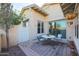 Relaxing patio with a bistro table and chairs, ideal for outdoor relaxation at 20377 W Terrace Ln, Buckeye, AZ 85396