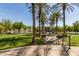 Community park with fountain, palm trees, and grassy areas at 20377 W Terrace Ln, Buckeye, AZ 85396