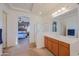 Main bathroom with double sinks, shower, and access to bedroom at 20377 W Terrace Ln, Buckeye, AZ 85396