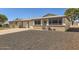 Front view of charming house with double garage and gravel landscaping at 10418 N 97Th Dr # B, Peoria, AZ 85345