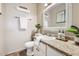 Bathroom with a granite countertop and white vanity at 10418 N 97Th Dr # B, Peoria, AZ 85345