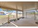 Covered patio with gravel and lattice privacy screen at 10418 N 97Th Dr # B, Peoria, AZ 85345