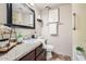Clean bathroom with granite countertop and updated vanity at 10418 N 97Th Dr # B, Peoria, AZ 85345