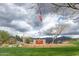 Entrance to community with flag and mountains in background at 3248 S Golden Barrel Ct, Gold Canyon, AZ 85118