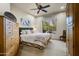 Bedroom with dresser, large bed, and window at 3248 S Golden Barrel Ct, Gold Canyon, AZ 85118