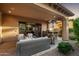 Relaxing patio with fire pit and seating area at 3248 S Golden Barrel Ct, Gold Canyon, AZ 85118