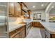 Modern kitchen with stainless steel appliances and wood cabinets at 3248 S Golden Barrel Ct, Gold Canyon, AZ 85118