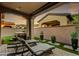 Private patio with lounge chairs and hot tub at 3248 S Golden Barrel Ct, Gold Canyon, AZ 85118