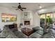 Relaxing living room with a cozy fireplace and ample seating at 3248 S Golden Barrel Ct, Gold Canyon, AZ 85118