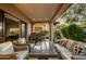 Patio with fire pit, seating area, and outdoor heater at 3248 S Golden Barrel Ct, Gold Canyon, AZ 85118