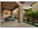 Private patio with lounge chairs and hot tub at 3248 S Golden Barrel Ct, Gold Canyon, AZ 85118