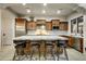 Gourmet kitchen boasts granite countertops, stainless steel appliances, and custom wood cabinetry at 3248 S Golden Barrel Ct, Gold Canyon, AZ 85118