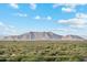 Stunning view of mountain range under a partly cloudy sky at 40170 W Hillman Dr, Maricopa, AZ 85138