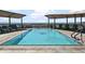 Rooftop pool with comfortable seating and stunning city views at 7175 E Camelback Rd # 202, Scottsdale, AZ 85251