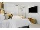 Bright bedroom with plush bedding and large closets at 7175 E Camelback Rd # 202, Scottsdale, AZ 85251