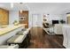 Open concept kitchen with island, granite countertops, and wood cabinets at 7175 E Camelback Rd # 202, Scottsdale, AZ 85251