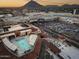 Aerial view showing building amenities, including a rooftop pool at 7175 E Camelback Rd # 202, Scottsdale, AZ 85251