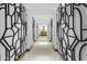 Elegant hallway with unique geometric wall art at 7175 E Camelback Rd # 202, Scottsdale, AZ 85251