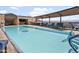 Resort-style rooftop pool with lounge chairs and city views at 7175 E Camelback Rd # 202, Scottsdale, AZ 85251