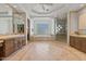 Elegant bathroom featuring double vanities, a soaking tub, and a walk-in shower at 5455 E Berneil Dr, Paradise Valley, AZ 85253