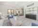 Game room with seating area and a built-in cabinet at 5455 E Berneil Dr, Paradise Valley, AZ 85253