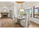 Bright dining room with hardwood floors and a view to the backyard at 5455 E Berneil Dr, Paradise Valley, AZ 85253