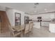 Kitchen features white cabinets and a large pantry at 794 E Christopher St, San Tan Valley, AZ 85140