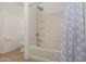 Bathroom with shower/tub combo and tile flooring at 794 E Christopher St, San Tan Valley, AZ 85140